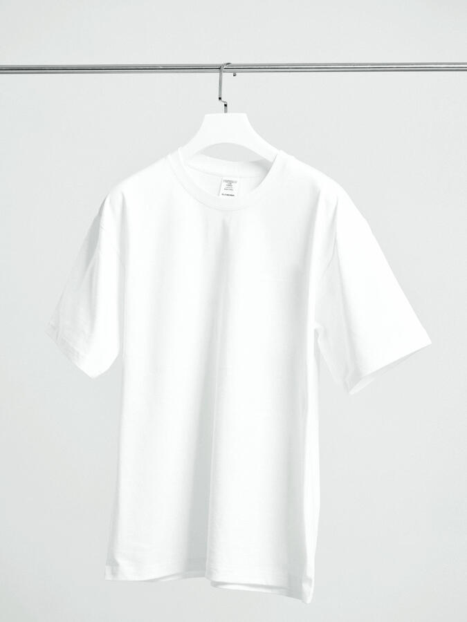 Plain white t-shirt on hanger, before Ai model placement